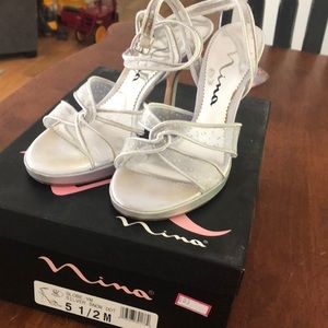 Nina silver snow dot globe heel